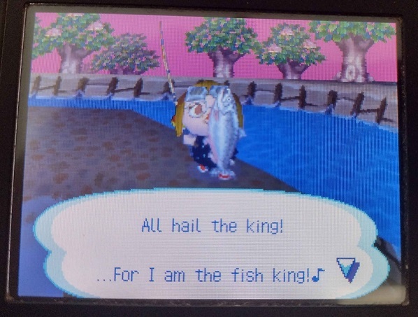 my wild world character holding a king salmon